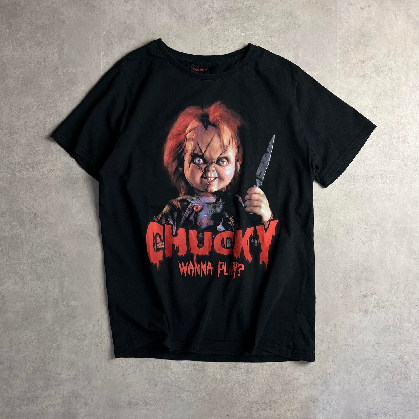 Universal Studios Chucky merch póló
