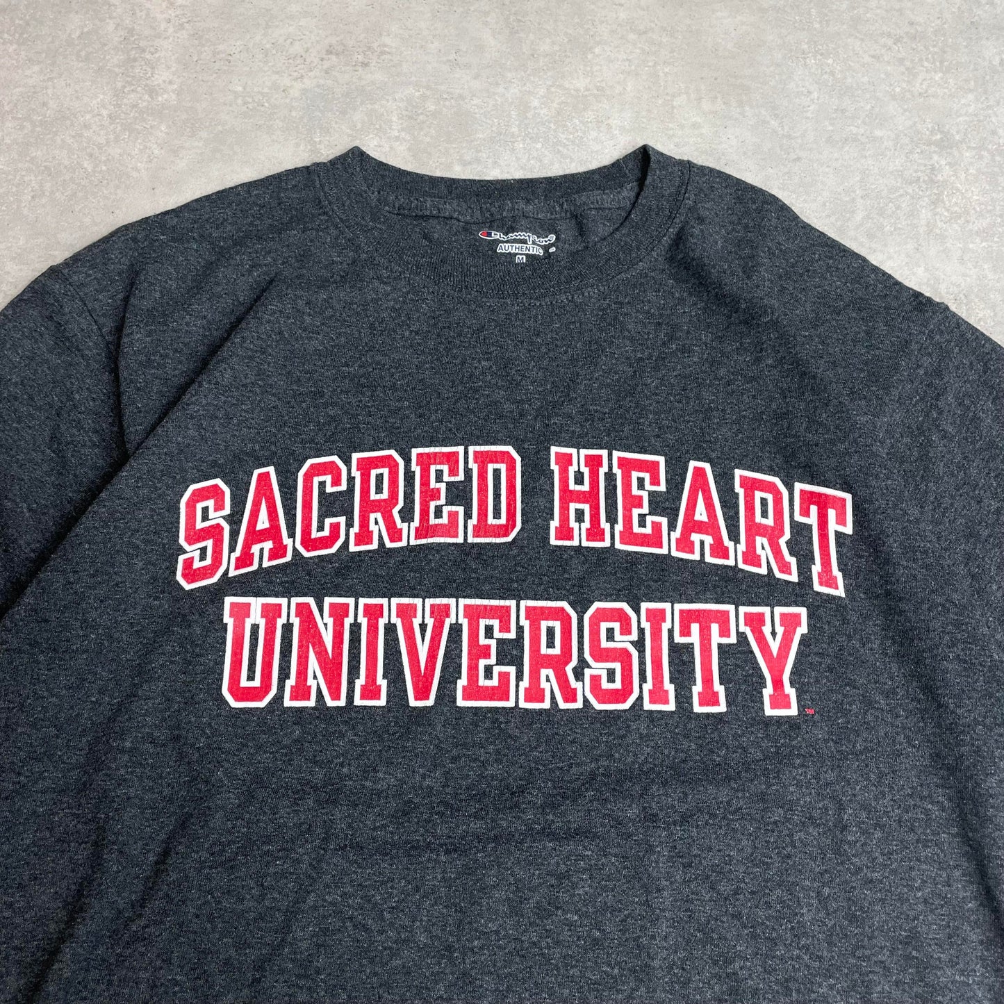 Champion Sacred Heart University póló