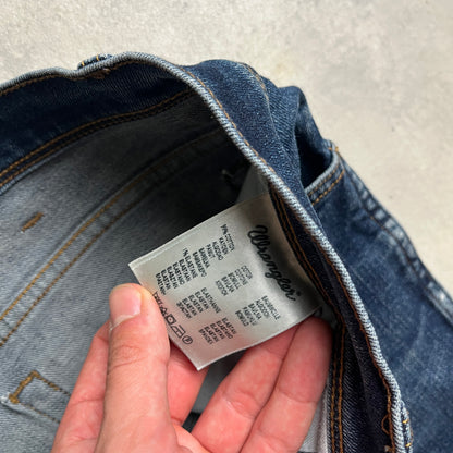 Wrangler koptatott térdű farmernadrág